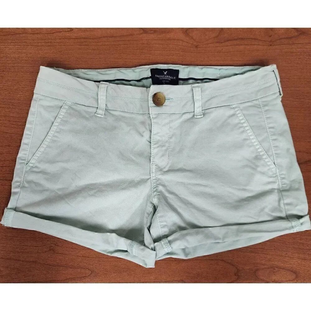 American Eagle Strech 4 mint green flat front shorts. Measures approx 30 waist,